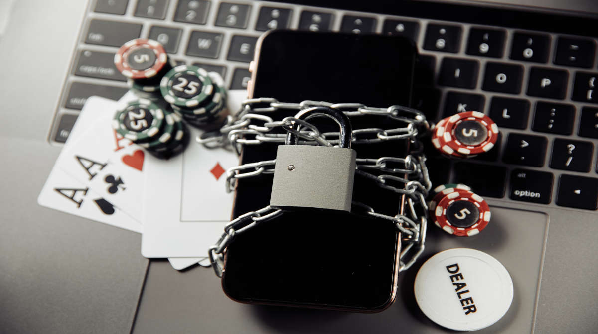 A person looking at a laptop screen with a concerned expression.