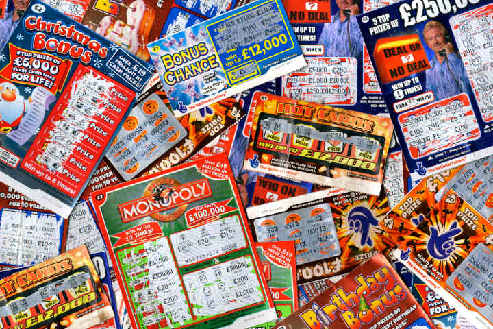 A collection of winning scratch-off lottery tickets.