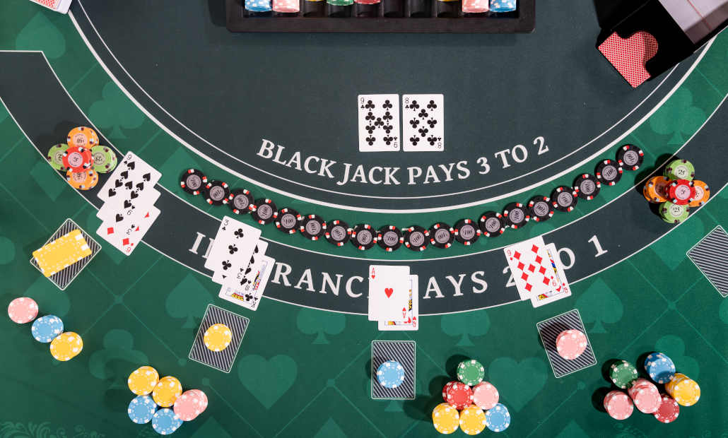 A digital representation of blackjack cards and chips.