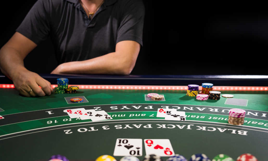 A blackjack table layout showing cards and chips.