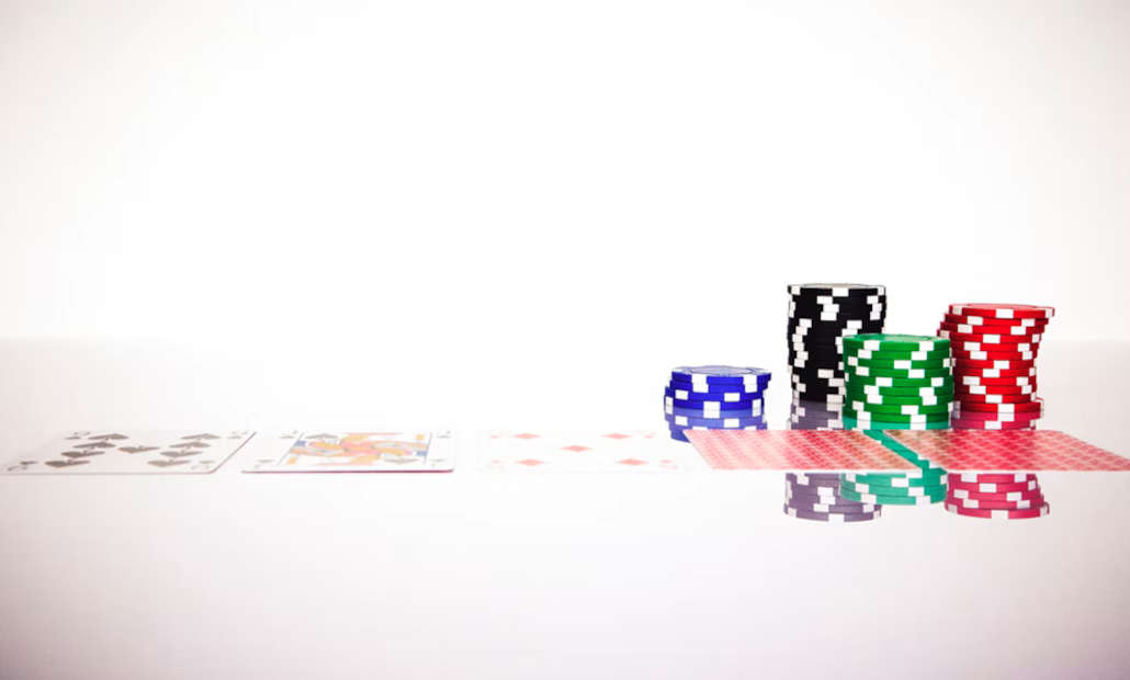 A person analyzing charts to find games with the best winning chances.