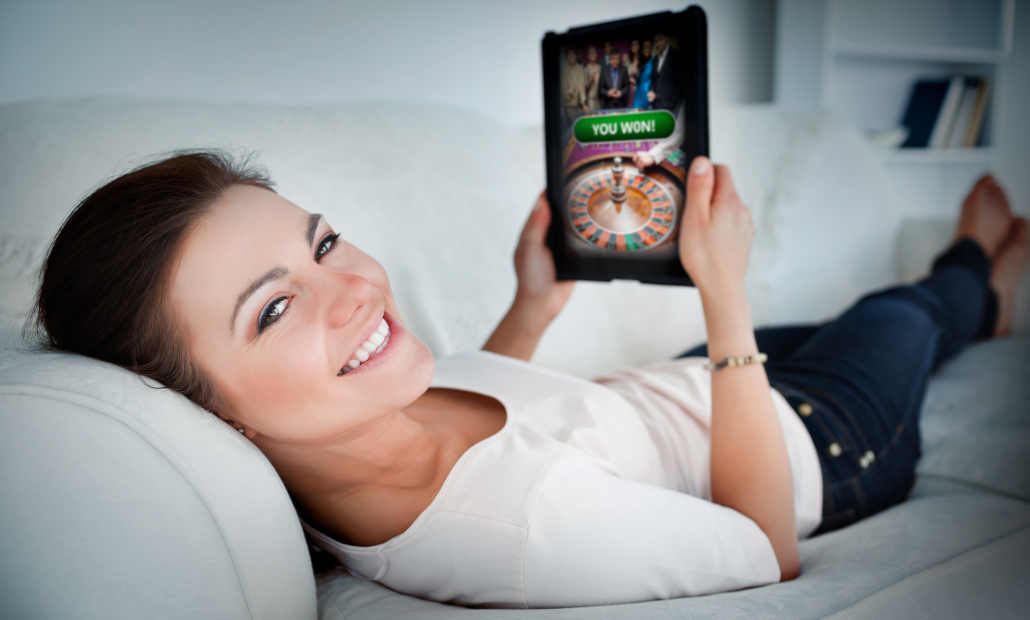 A person using a laptop to gamble online in Norway