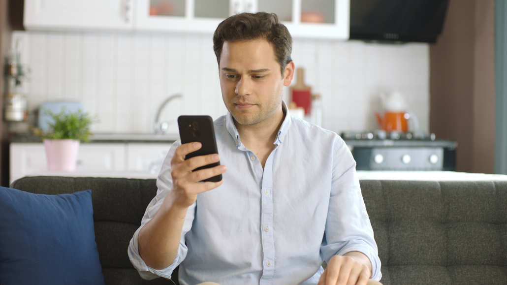 A live dealer slot game in progress with a host.