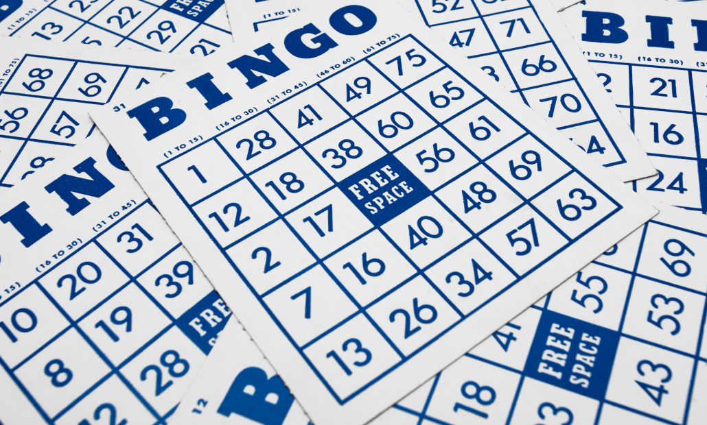 A modern bingo card and markers.