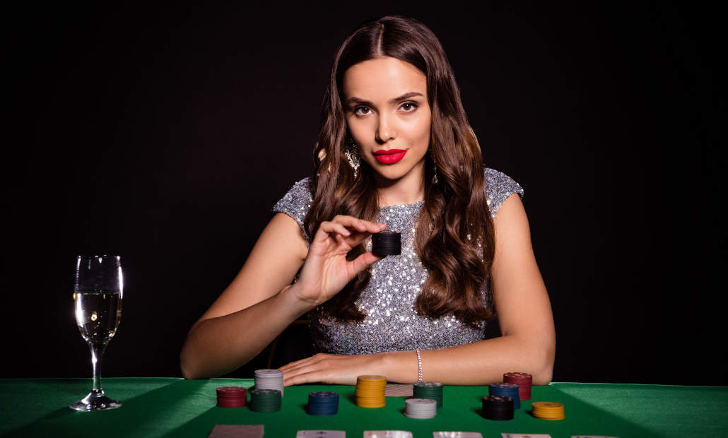 A person closely examining a poker chip to check its authenticity.