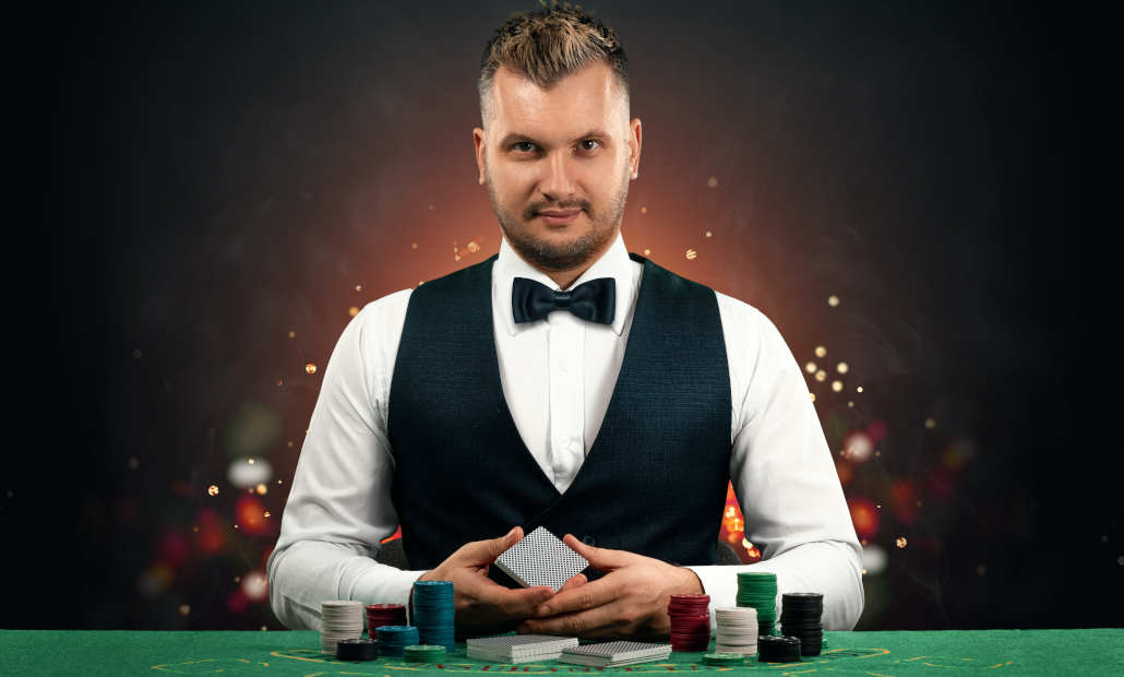A person shuffling cards with professional croupier technique.