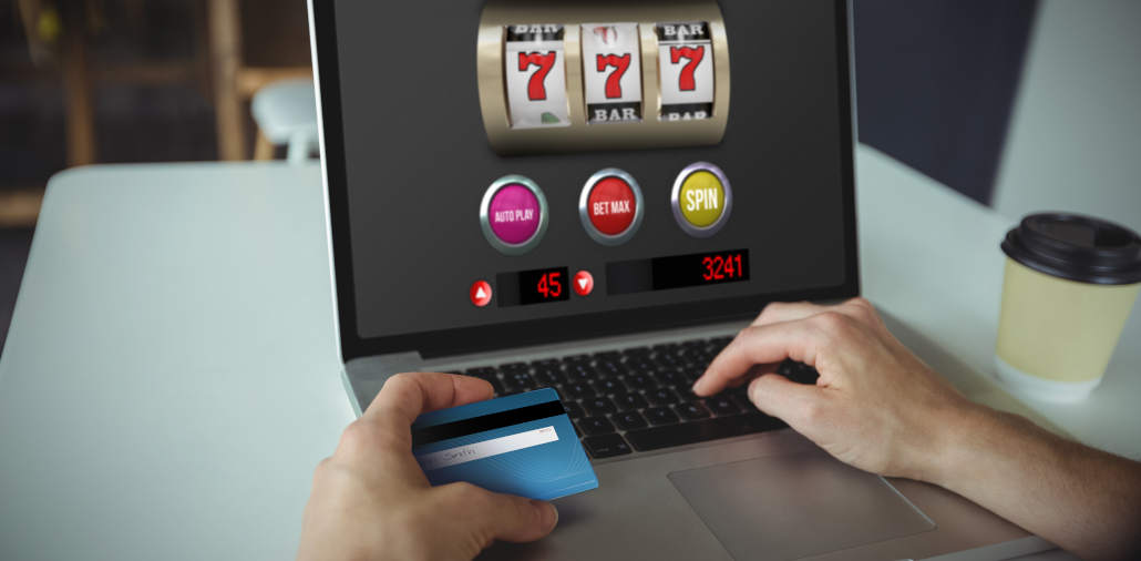 Person playing an online slot game on a tablet