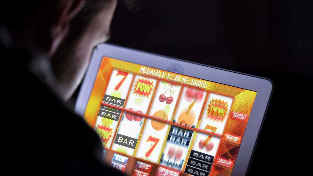 A collage of different online slot games shown on a screen.