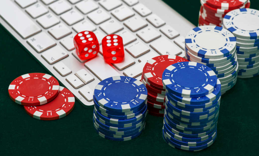 A craps table in a casino with players rolling dice.