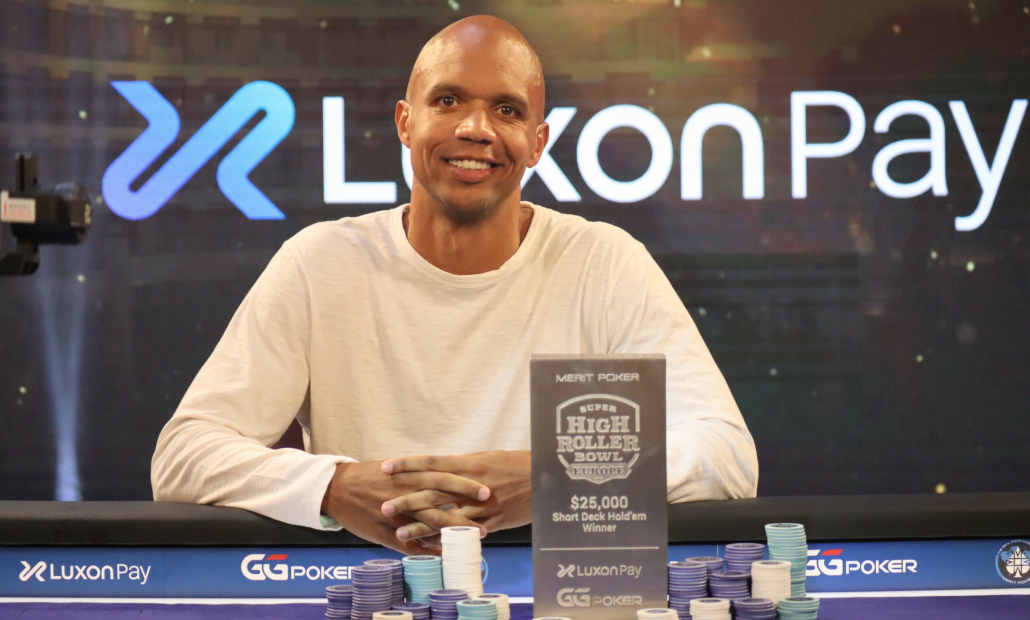 Phil Ivey looking intently during a poker game.