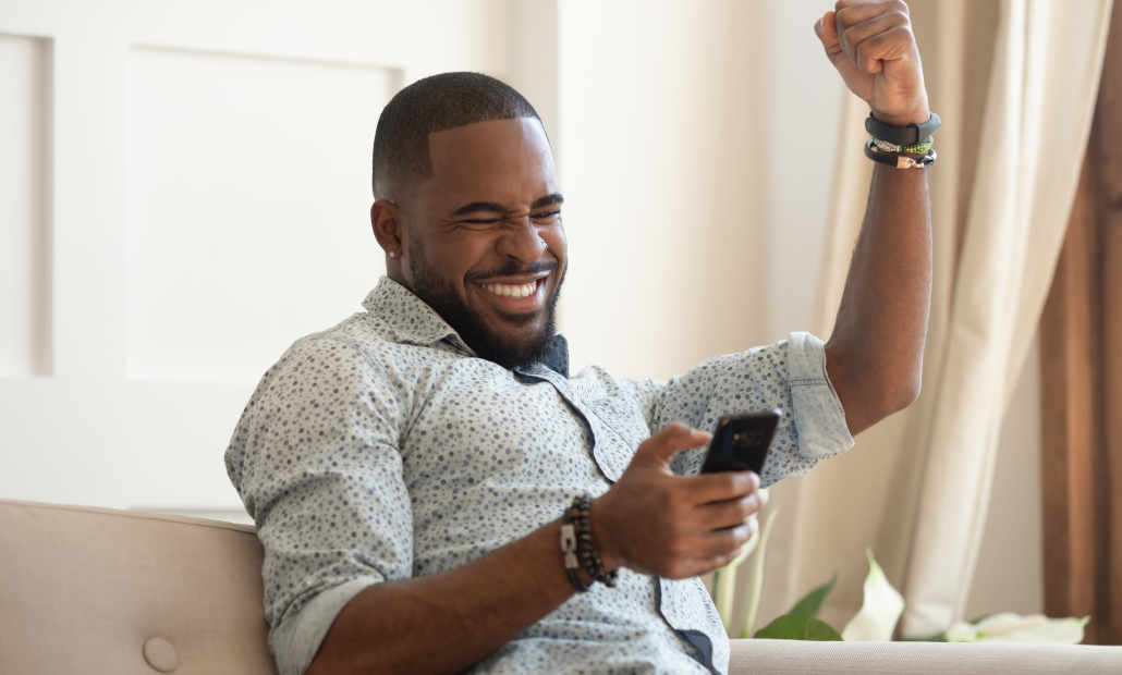 A person calculating betting strategies on a notepad