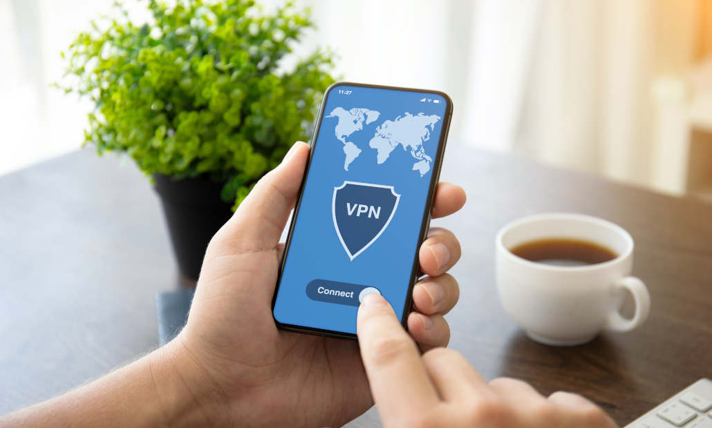 Illustration of a shield protecting a laptop, symbolizing VPN use for online casinos.