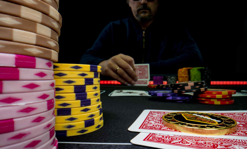 A poker tournament in progress with many players at tables.