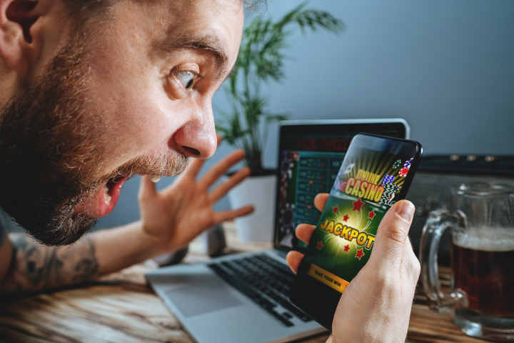 Close-up of a slot machine reel showing winning symbols.