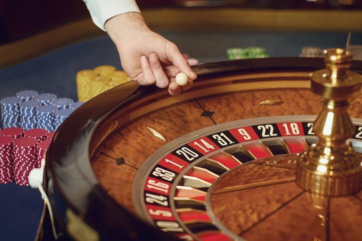 Close-up of a roulette wheel spinning.