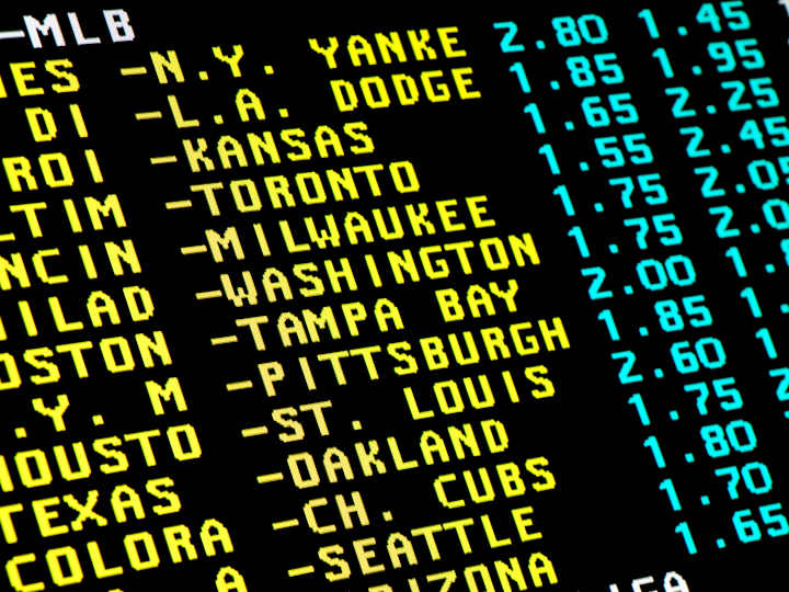A graphic showing various sports betting odds on a screen.