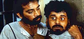 Satya and Bhiku Mhatre from the movie Satya