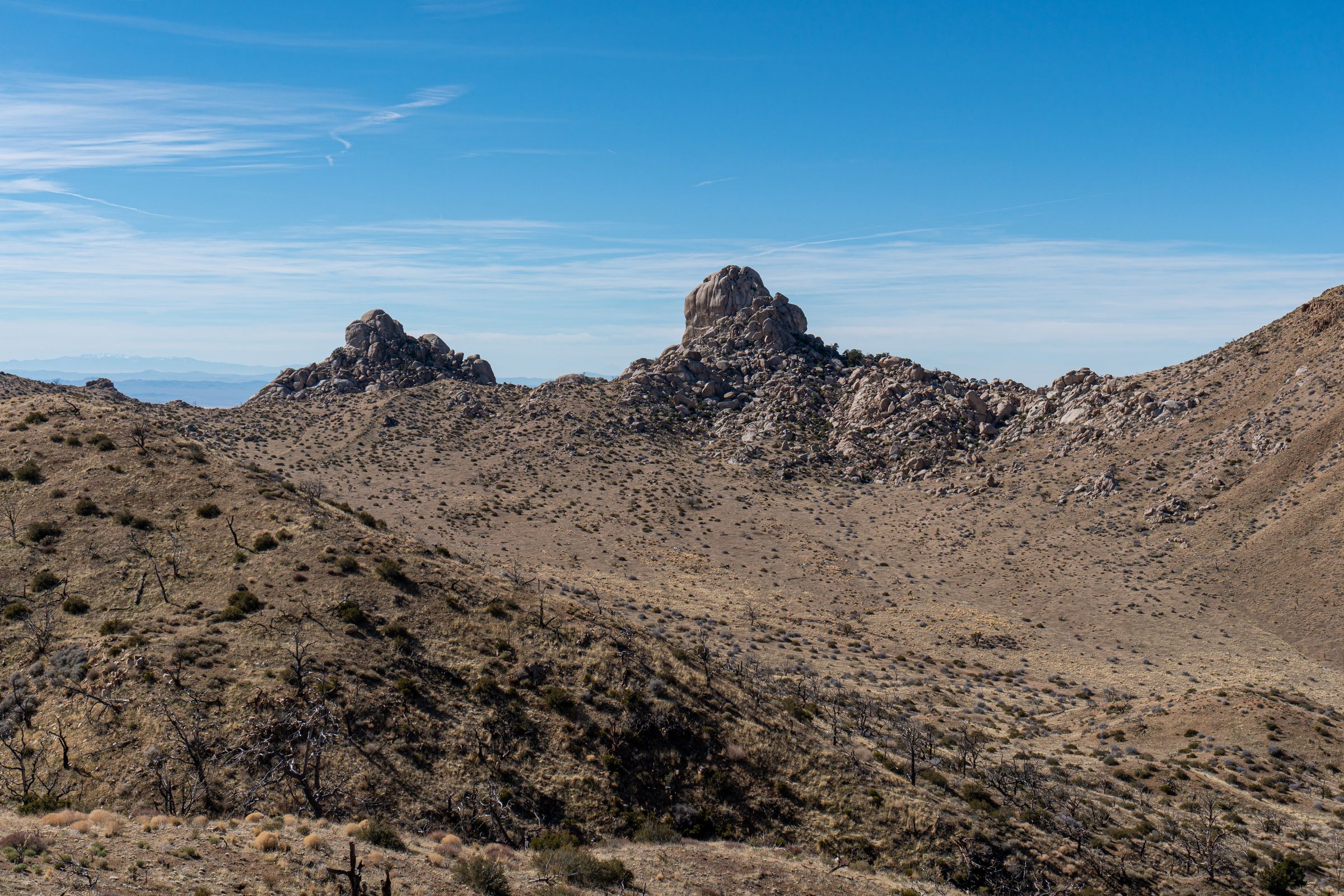 Boulders near Mid Hills Campground. In the foreground you can just make out burned junipers.