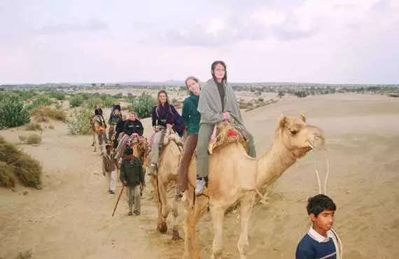 Enjoyig Camel Ride in Jaisalmer Desert