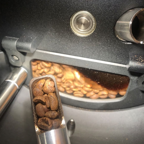 Coffee beans in a drum roaster