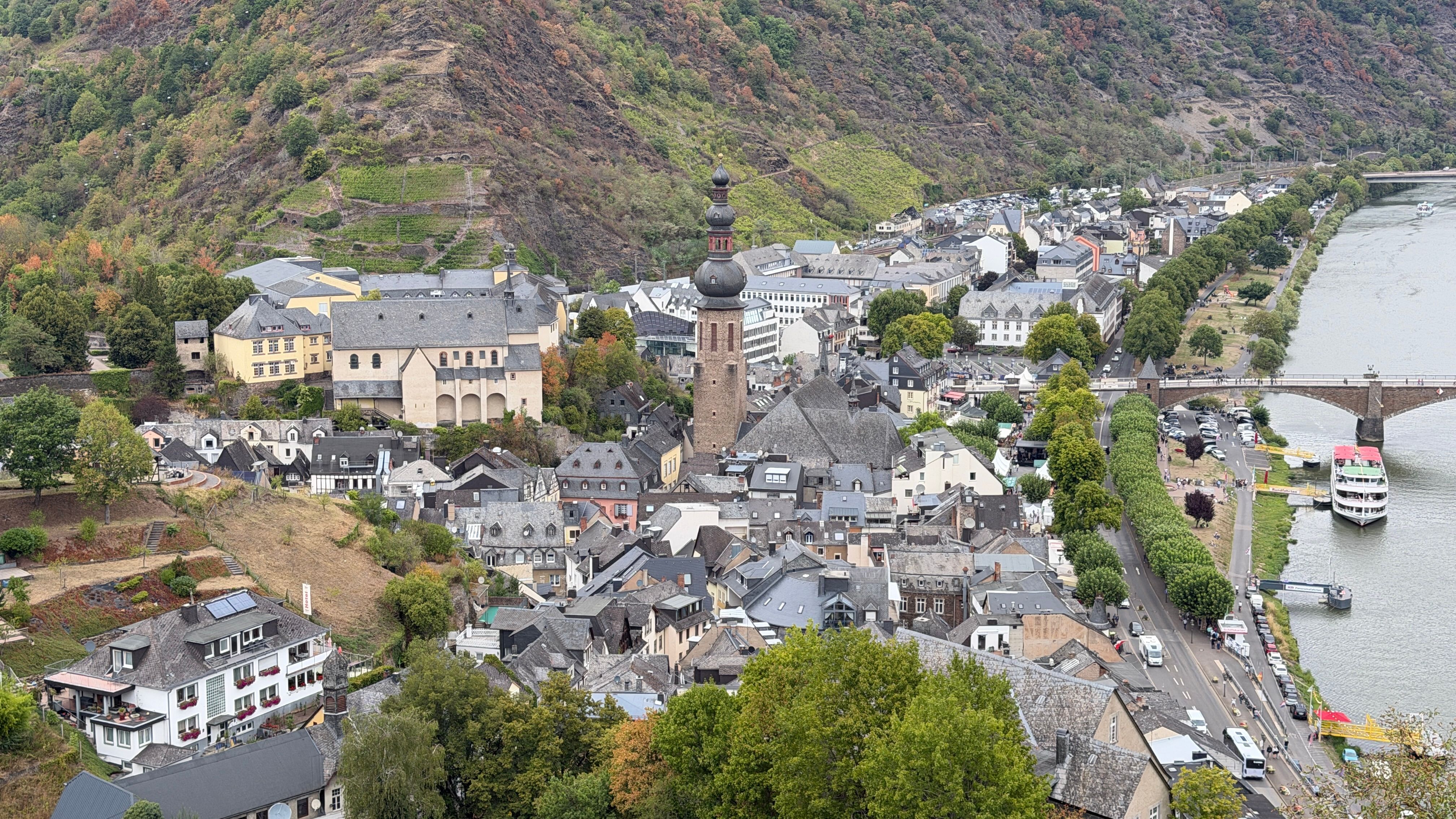 The Mosel promenade — bridge, boats and the town beyond