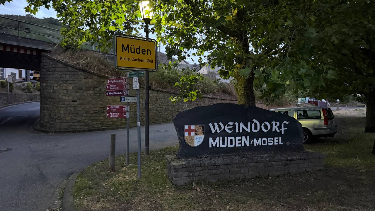 The stone Weindorf Müden/Mosel sign at the village entrance