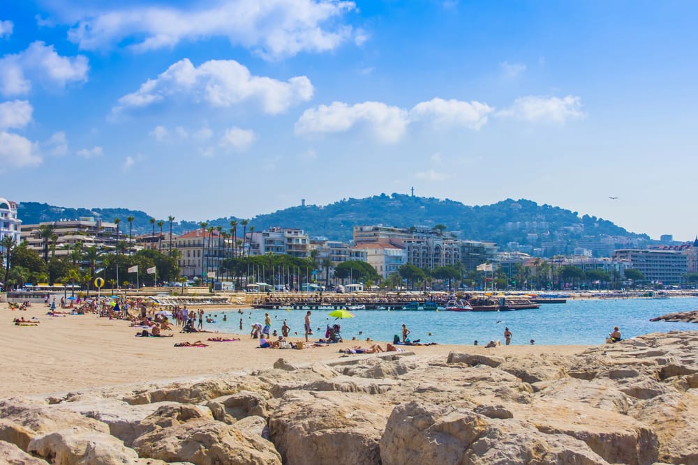 People Relaxing On The Beach In Cannes France