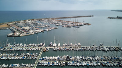 El Puerto de Torrevieja - Discover the excitement and tranquility of a bustling marina, where boats glisten in the sun and the waterfront beckons to explore.