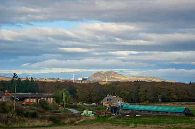 Bright autumn landscape of a rural area near Edinburgh with Arthur Seat behind