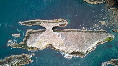 Bow Fiddle Rock - a natural sea arch rock formation - directly from above