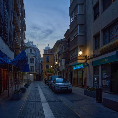 Cullera, Valencia, Spain - 05.21.2023 The essence of urban life captured in a single frame - a captivating blend of gloom, energy, and vibrancy amidst a bustling cityscape.