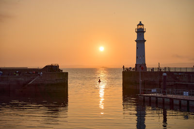 Sunset at Newhaven Harbour and the lighthouse