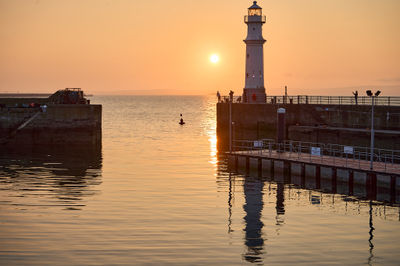 Sunset at Newhaven Harbour and the lighthouse