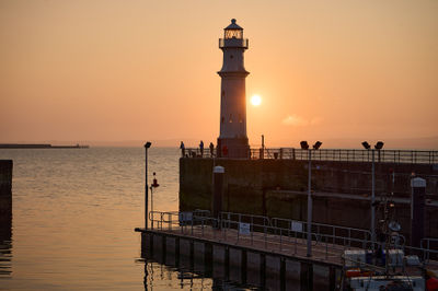 Sunset at Newhaven Harbour and the lighthouse