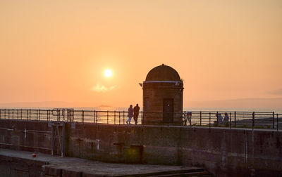 Sunset over the sea at Newhaven Harbour, Edinburgh