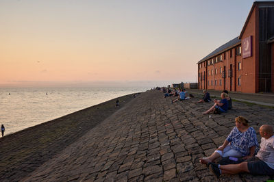 Calm evening at Newhaven harbour, Edinburgh. People relaxing