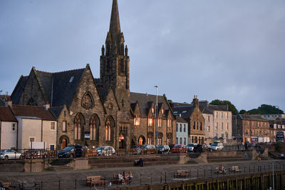Calm evening at Newhaven harbour, Edinburgh. A church across the street