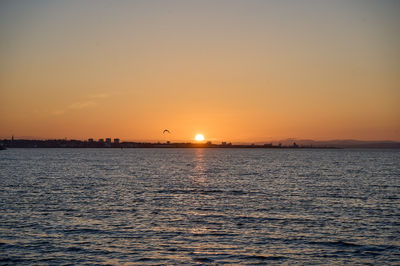 Sunset over Musselburgh harbour with Edinburgh on the background