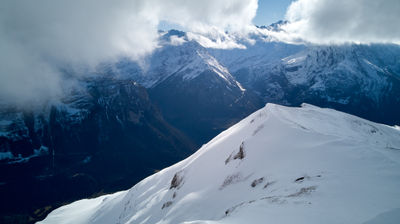 Snow peak from above - Swiss Alps