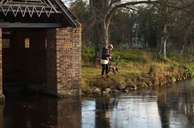 Person Walking Outdoors Shelter Grass Nature