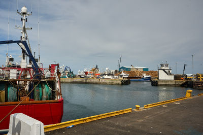 A view of the harbour with ships and cranes