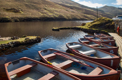 Moored boats on Scottish loch on a sunny day