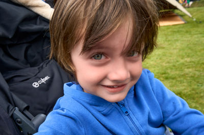 Lauder, Scottish Borders, UK - June 19 2022: Little cute boy at Jackie Stewart Classic Car Show