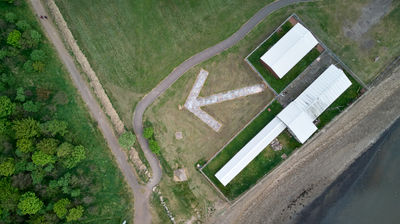 Musselburgh - RAF Air buildings, An arrow in the field. Aerial photo
