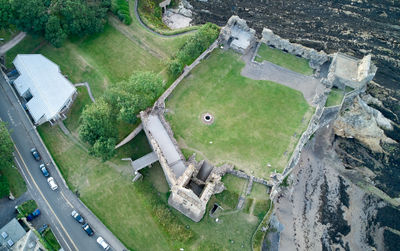 St Andrews Castle - ruin - at seashore. Drone photo