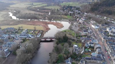 Drone footage. Flying over river Teith and the town of Callander. Scotland, Highlands