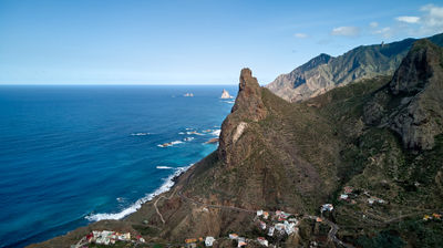 Tenerife coastal village on a  mountain slope - ocean below