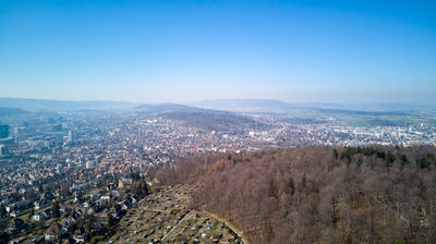 Drone view - flying over Uetliberg mountain in Zurich. Panoramic view