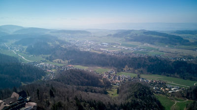 Drone view on Uetliberg mountain in Zurich. Panoramic view with Lake Zurich and Alps on horizon