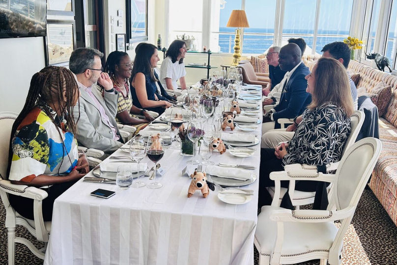Group of people sitting at a roundtable event